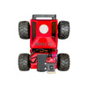 Red monster truck model with large black tires on a white background